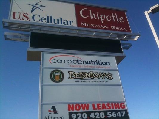 The big sign on College Ave, we're next to Chipotle!