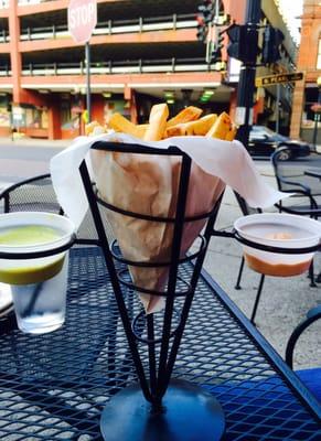 Fries with dipping sauces.