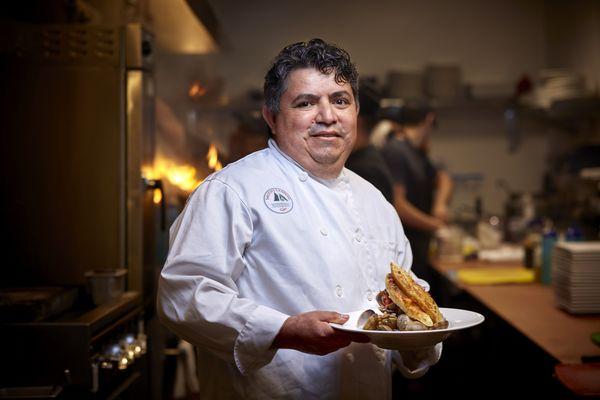 Business portrait of chef in restaurant