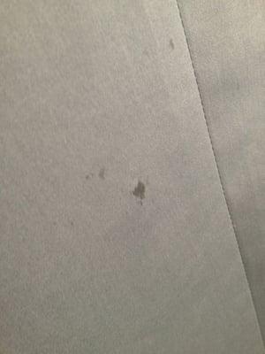 Black substance found on my suit coat after brining it here.