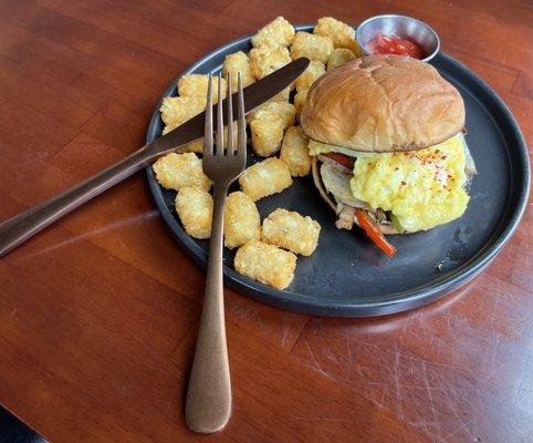 Veggie breakfast sandwich and herbed tater tots