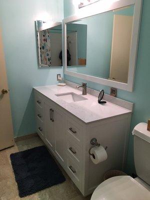 New paint, vanity, mirror, and medicine cabinet