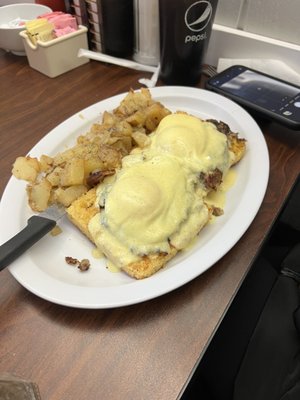 Eggs Benedict over hash and cornbread