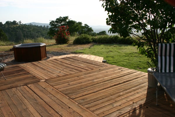 custom modular deck from rough sawn cedar