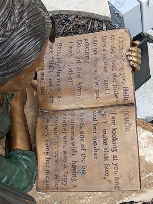 Statues in garden outside library