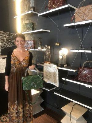 The gallery owner and artist Carla Cid de Diego with her handmade hand bags