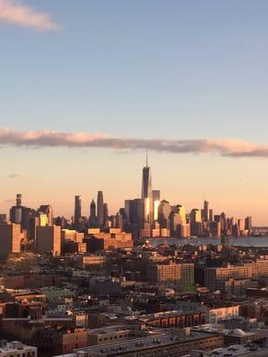 Sunset reflecting on freedom tower