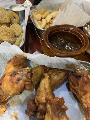 Wings, fries and gravy dipping sauce.