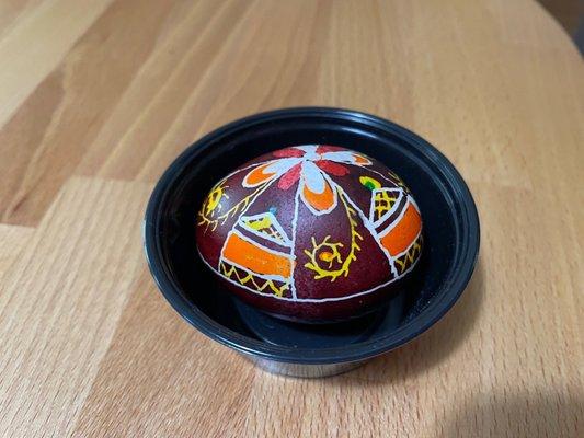 Melted off the layers of beeswax to reveal the layers of color of the pysanky egg.