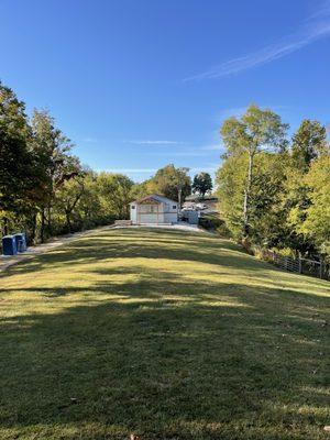 Grass between pavilion & shop