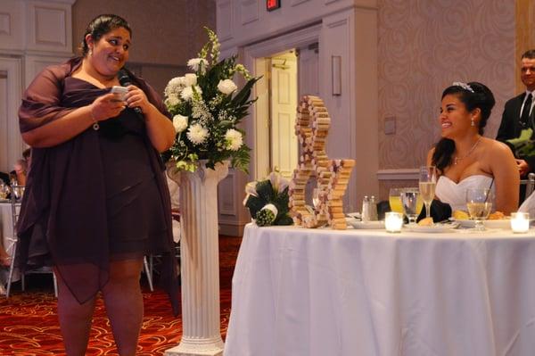 We used the white floral arrangements in the ceremony and at the reception.  The columns were rented and looked great!