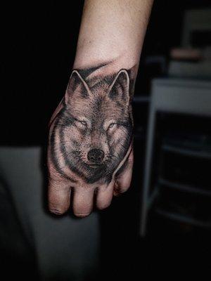 Wolf Hand Tattoo