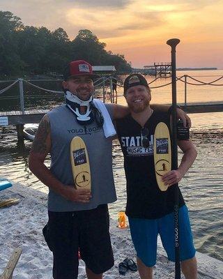 The Adventure 30A paddle team and their 1st place trophies for the annual YOLO paddle series!