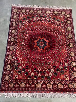 Pure beauty seen in this Afghan hand made rug