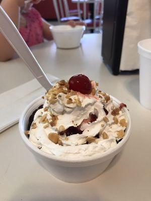 Hot fudge sundae with raspberries.  Hit the spot