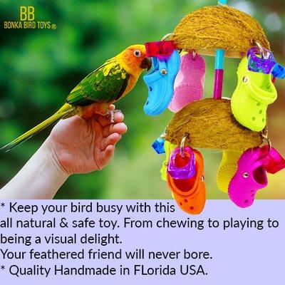 806 Duo coco sandal bird toy is a perfect addition for your large feathered friends, two half husk coconuts are adorned with colorful foot t