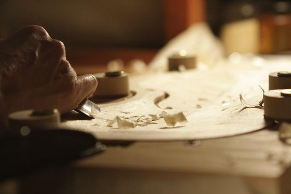 Shaping the front of a violin