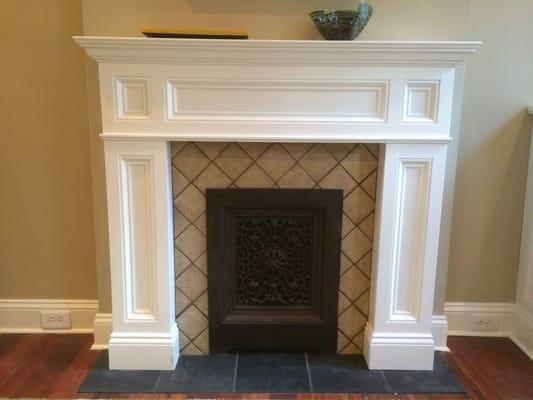 Fire place Mantel with tile around.
Antique summer fire place cover