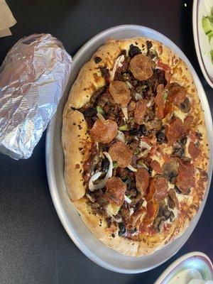 Half supreme half pepperoni with mushrooms pizza