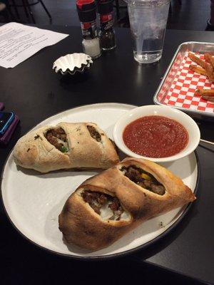 Stromboli with warm marinara on the side.