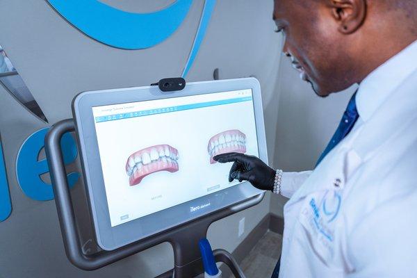 Dr. A looking at dental 3D scans on the iTero at Smile Design Dental Studio in New York