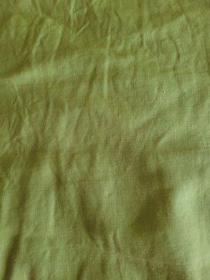 This is what unstained couch cover looks like. A slightly more intense shade of apple green, but again, the difference is barely delectable