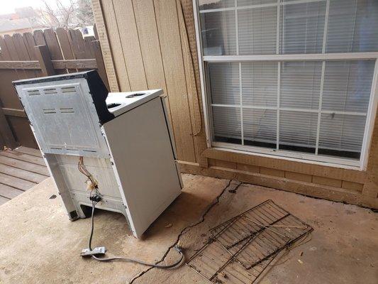 The oven that's on my porch right now, there was a fridge too but they finally moved the fridge.