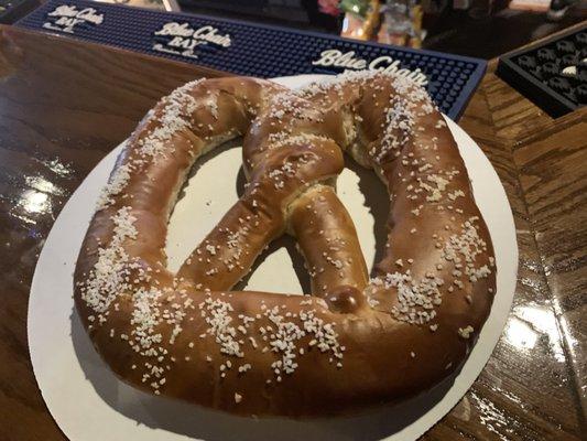 The diameter of a small pizza, 3" thick, and freshly baked. The best soft pretzel I've ever had.