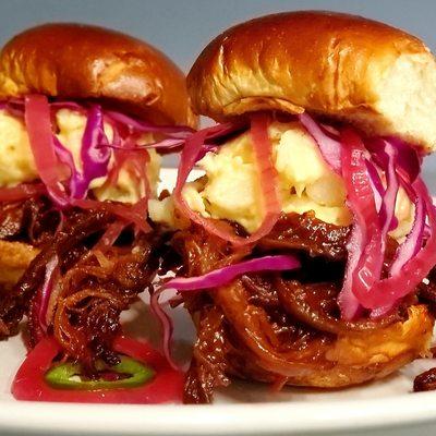 DAT COUNTRY GRAMMA - 2 Smoked Angus BBQ Angus brisket sliders topped with granny's potato salad and pickled red onions on Brioche. Ya Hur Me