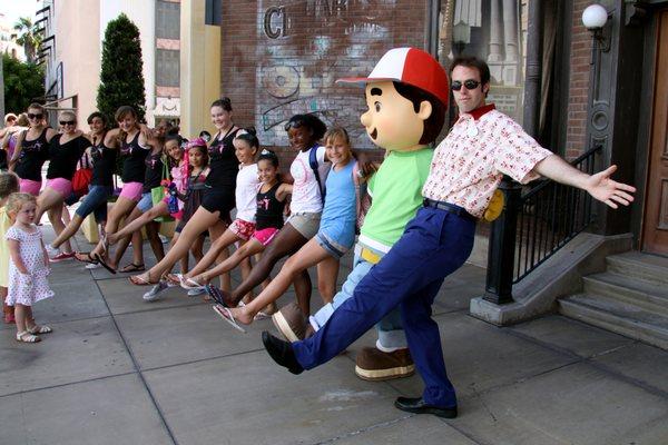 Having fun in Disneys California Adventure, dancing with Handy Manny