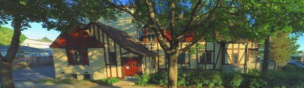 Side entrance off of Eleanor. Free parking on street and in alley, marked "Edyth Bush Theatre Building."