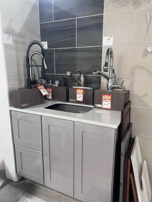 Different option displays, cabinet, cabinet color, faucets, tile back splash. Lots of Sale items too