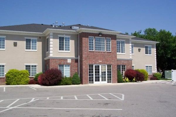 Back of the office with lots of convenient parking. Building also has elevator access to second floor.