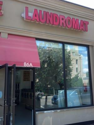 RnRs Laundromat, across the street from St. Agnes, one block from the LIRR station.