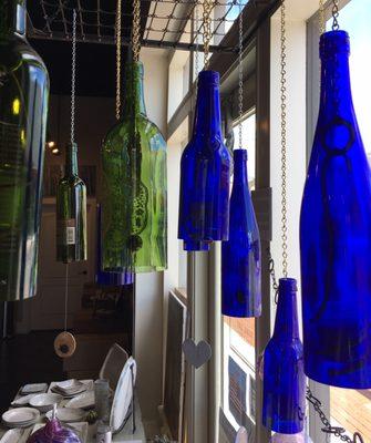 Glass candleholders and windchimes by Sarah Headrick