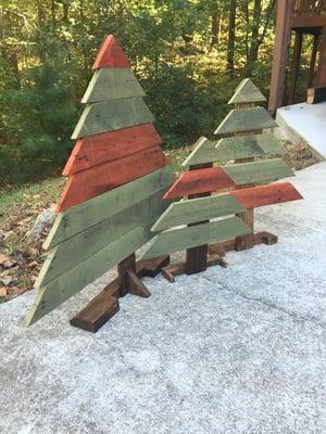 Christmas tree trio. stained in red & green. Made from salvaged pallet wood. To order, call (770) 362-6289.