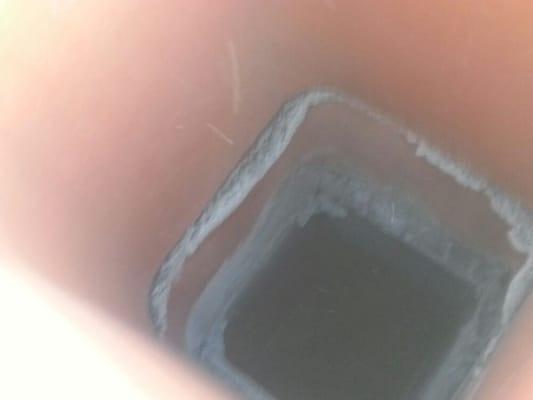 Chimney flue after cleaning and replacing top cracked linear with new 13x13 linear