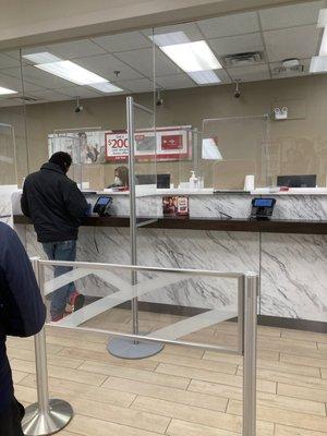 One teller horrific  Guy at window for 15 minutes.   This place is the worst