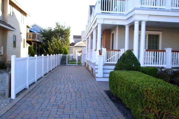 Vinyl Privacy Fence & T-Rail with Mocha Walnut top rail