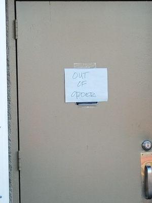 Picture of the "Out Of Order" sign on the bathroom door taken just 2 days ago.