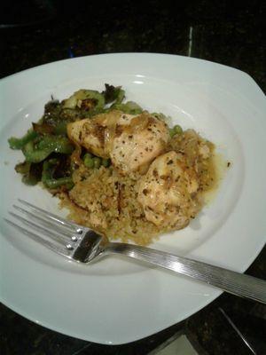 Rosemary chicken on a bed of cauliflower rice, peppers, onions and mushrooms