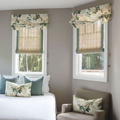 Natural Woven Shades with edge binding and a valance can add interest and warmth to a casual space