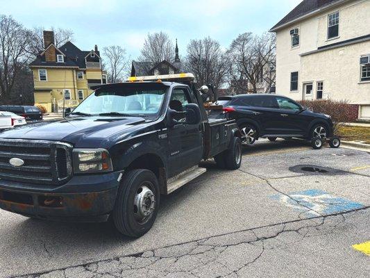 Using dollies to tow a truck