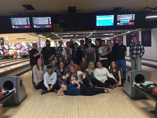 Staff (and their guest) enjoying our Holiday party