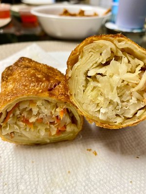 Vegetable egg roll on left and shrimp egg roll on right. Supporting local Asian restaurants.
 (^‿^)