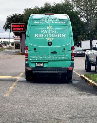 Dec 2021: The company van sits in the business's shared parking lot