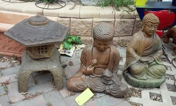 Reasonable priced Asian statues, thinking about getting the pagoda or a lantern for the flowerbed near the front door.