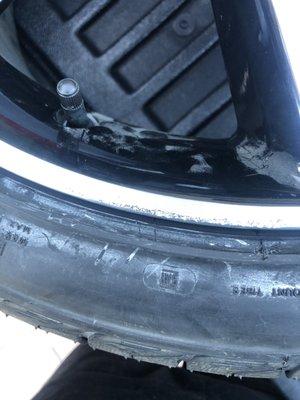 Damage done by tire shop , this is not curb rash this damage is inconsistent and goes up not sideways like curb rash