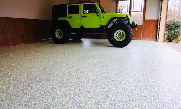 Our Epoxy Flake Garage Floors are beautiful and resilient.  We offer Military Discounts!