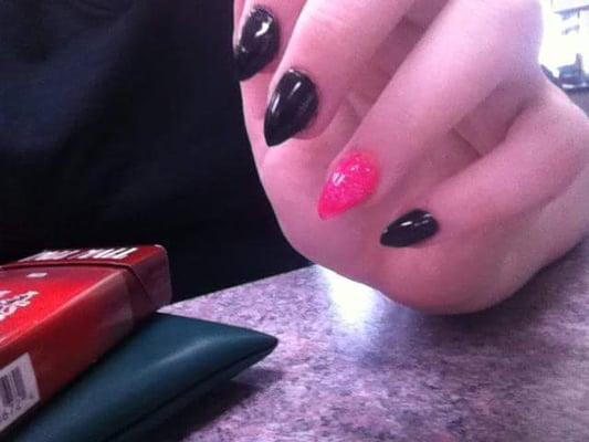 Pink and black stiletto nails. Done by Annalise.